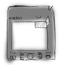 W-ZERO3の液晶にテープを貼ります。